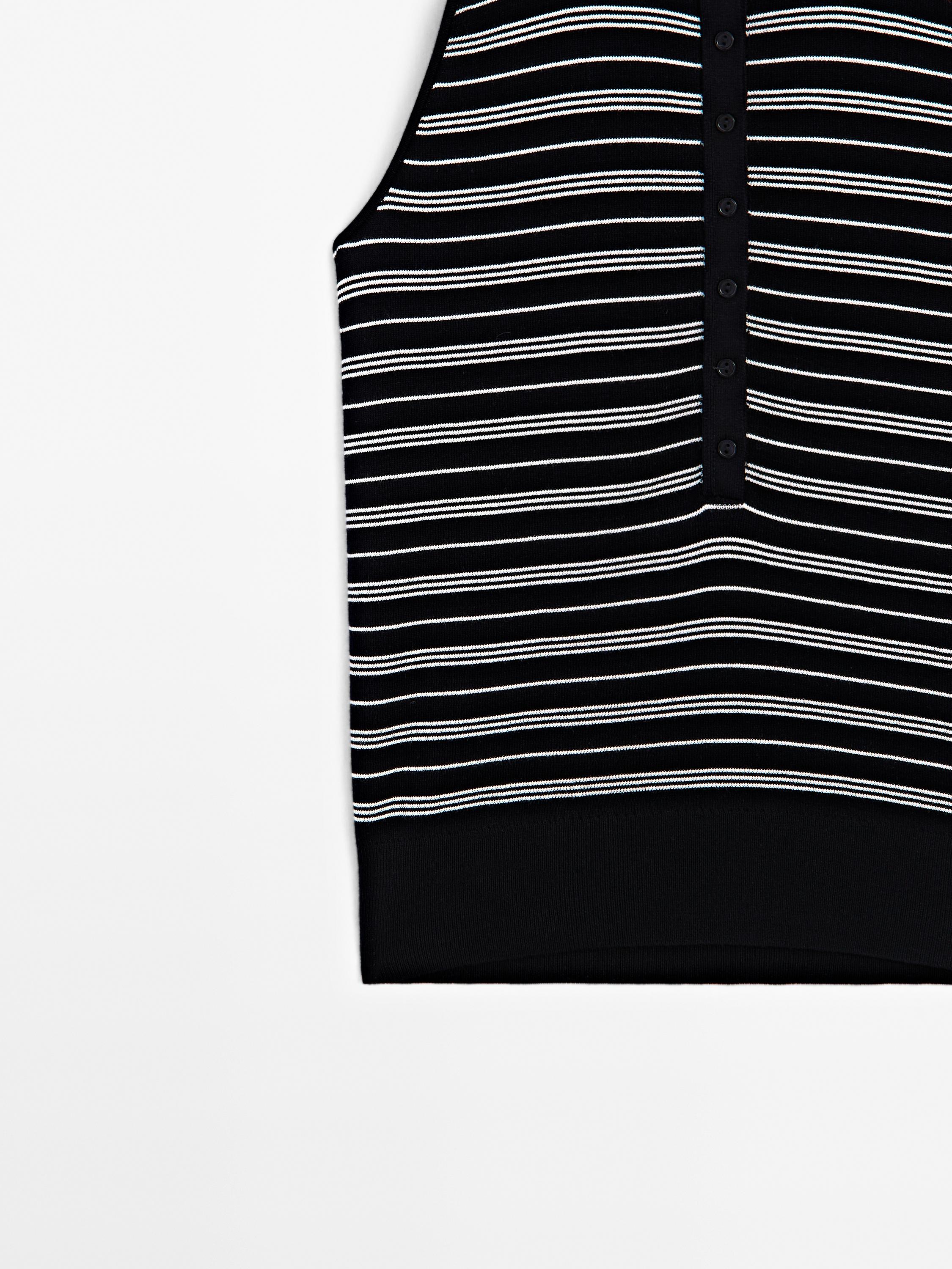 100% cotton polo shirt with striped details